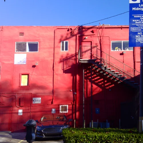 A fire escape on a red building